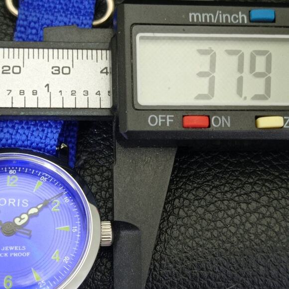 Vintage 1981 Oris Manual Mens Silver Watch W/Nato Strap & Blue accents - Picture 7 of 9